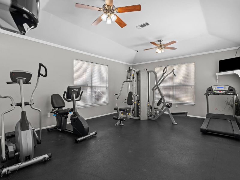 Encino Park apartments community fitness center with strength and cardio equipment